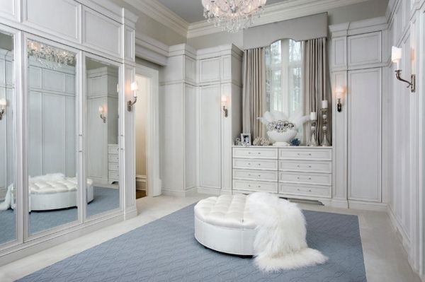 Example of a large transitional gender neutral carpeted dressing room design