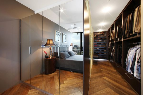 Example of a large transitional gender neutral carpeted dressing room design