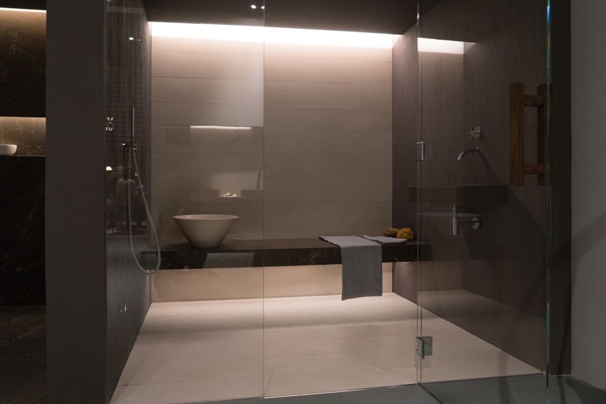 modern shower with a bench