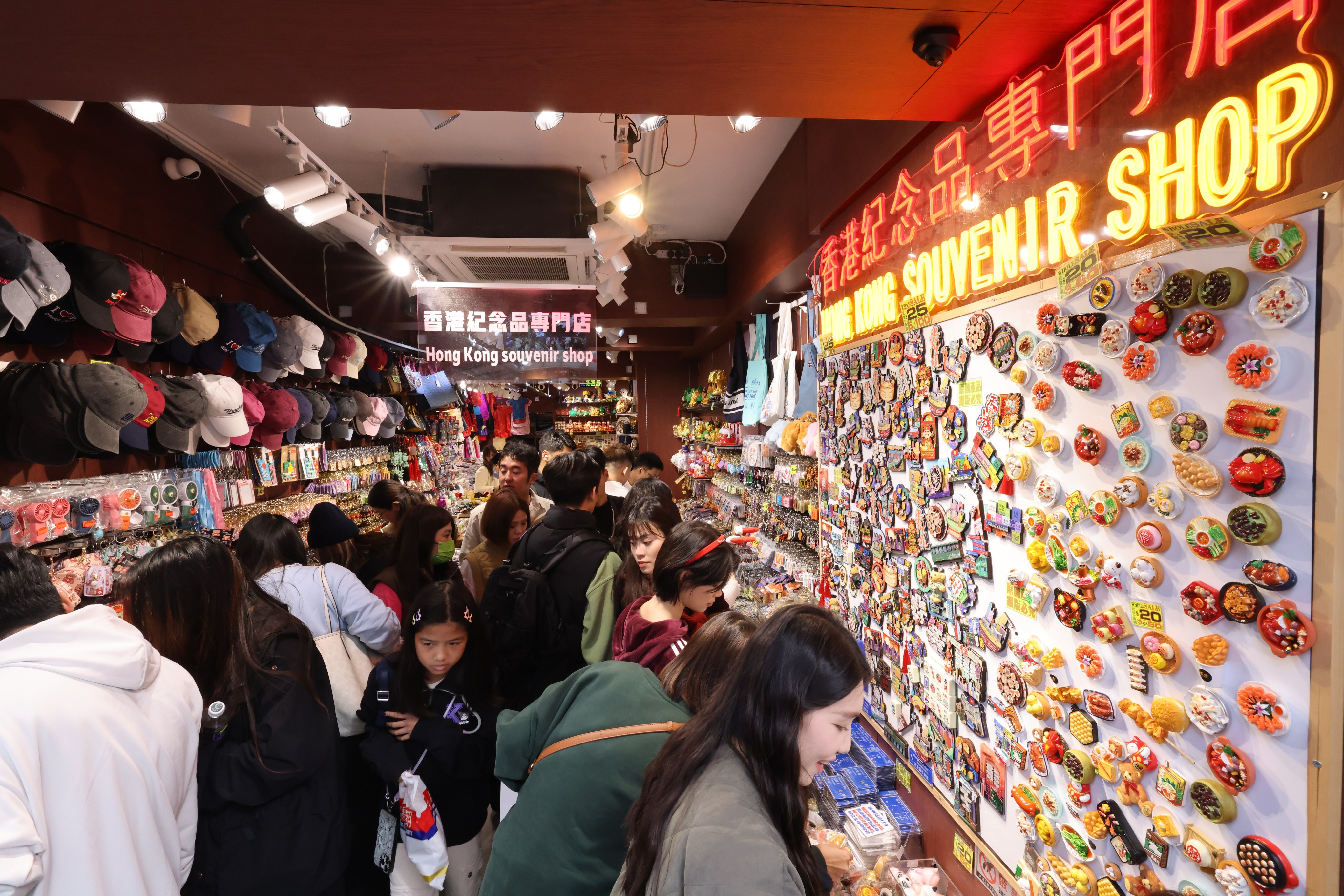 Tourists shop on Christmas Day. Photo: Nora Tam