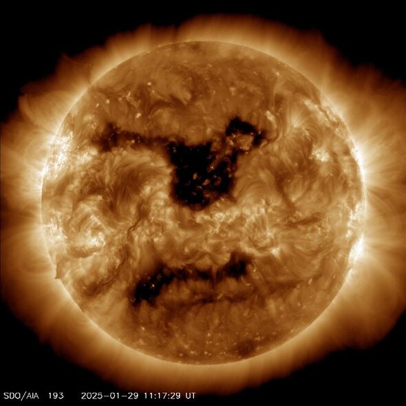 nasa scientists huge hole sun size of earth