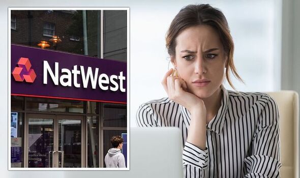 A concerned woman looks at her laptop