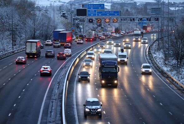 driving gesture warning headlights fine speeding