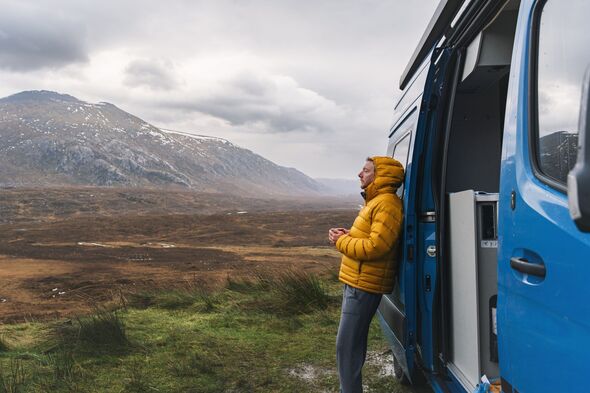 Motorist admires the view from the North Coast 500