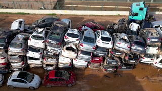 Floods lead to these "car graveyards" filling up in Spain