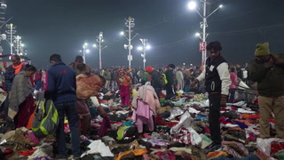 Scattered belongings line floor after fatal stampede in India