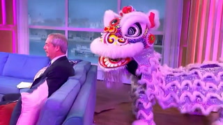 Nigel Farage has awkward encounter with Chinese Dragon on This Morning