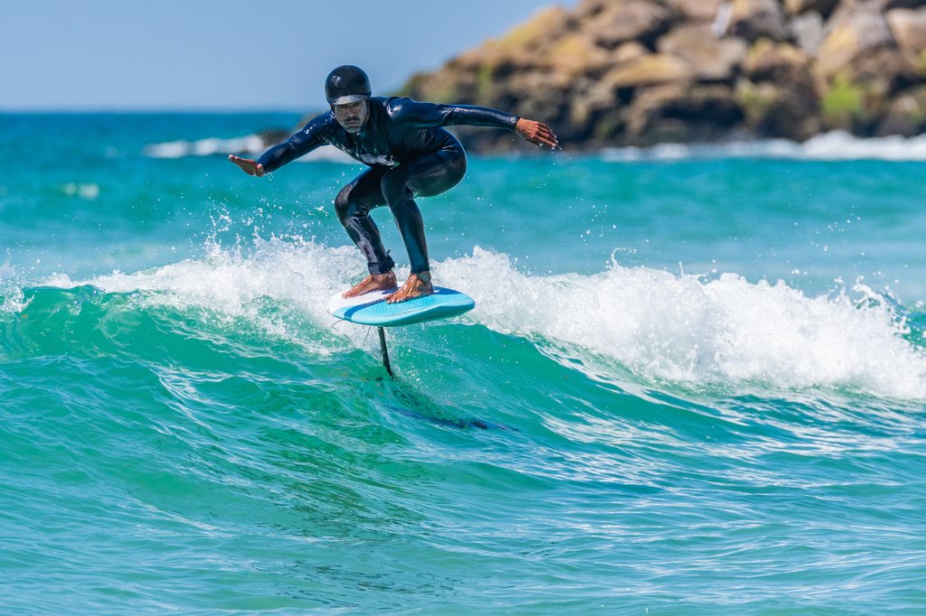 surfer in blue water