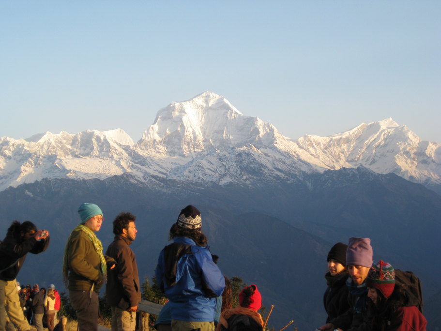 Trekkers gather for sunrise on Muldai Peak