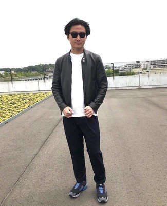 Black and Blue Athletic Shoes Outfits For Men: If you're in search of a casual and at the same time on-trend look, try teaming a black leather bomber jacket with black chinos. Send an otherwise sober look down a more informal path by rocking a pair of black and blue athletic shoes.