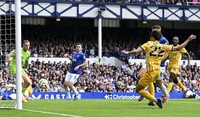 Brighton's Kaoru Mitoma (22) opens the scoring in the first half of his team's Premier League football opener against Everton on Aug. 17, 2024, at Goodison Park in Liverpool, England. (Kyodo)