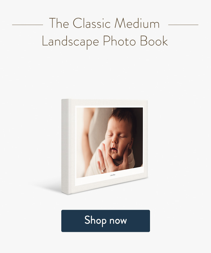 Classic Medium Landscape Photo Book with baby on the cover.