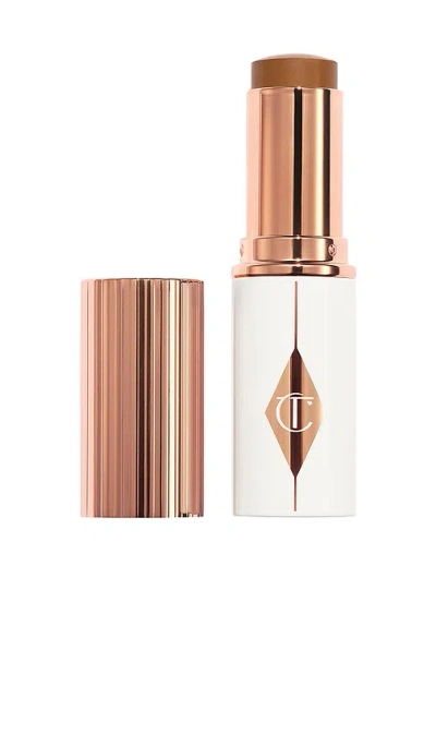 Charlotte Tilbury Unreal Skin Sheer Glow Tint Hydrating Foundation Stick In 13 Deep