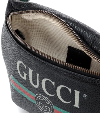 Shop Gucci Printed Leather Belt Bag In Black