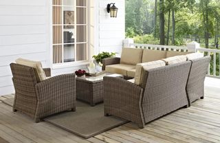 A wicker-effect outdoor sofa set