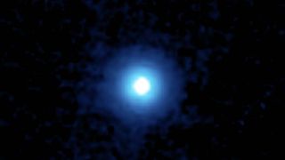 Vega star appears as a bright white orb surrounded by a blue glow.