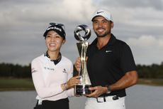 Lydia Ko and Jason Day hold the Grant Thornton Invitational trophy