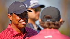 Tiger Woods and Charlie Woods celebrate the hole in one at the PNC Championship