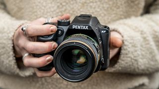 Pentax KF being held by Hannah Rooke