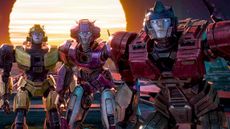 Bumblebee, Elita-1, and Optimus Prime stare directly into the camera in Transformers One, one of September's new movies