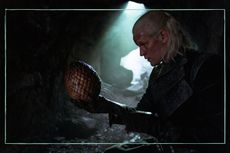 a still of Matt Smith holding a dragon's egg in House of the Dragon