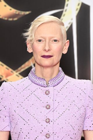 tilda swinton with her hair cut into a pixie cut.