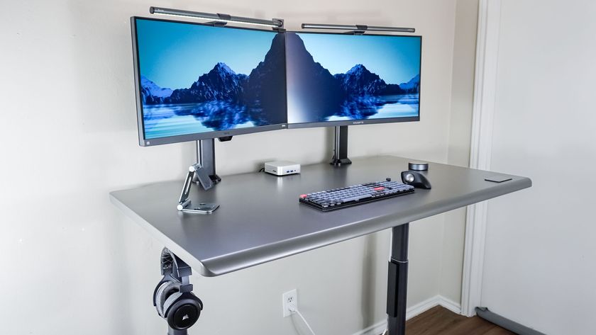 A dual-monitor setup built around the Autonomous SmartDesk 5 and the Geekom A6 mini PC