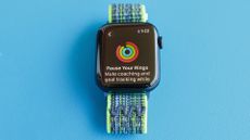 Close-up of the Apple Watch SE 2022 and Apple's Activity app where you can now pause Rings