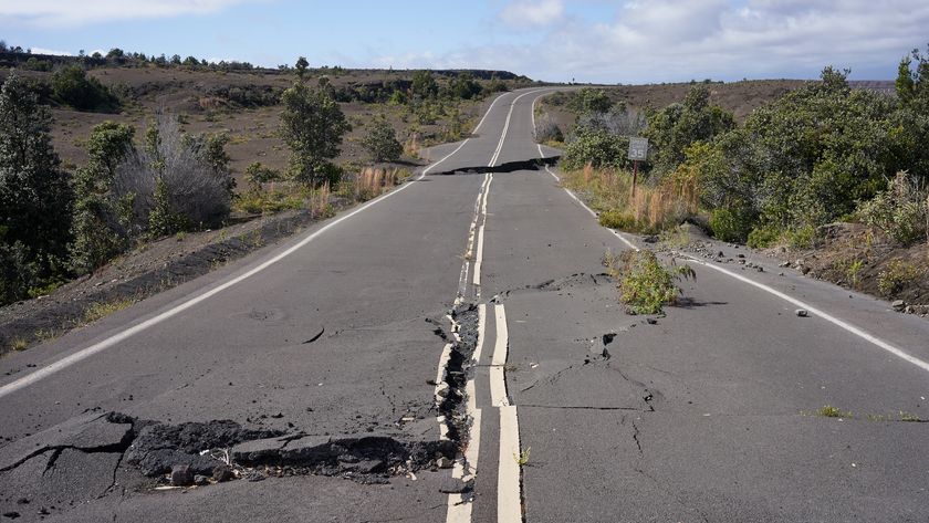 a photo of a road cracked by an earthquake