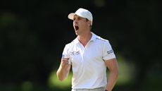 Calum Hill roars with delight after holing a birdie putt on the 18th hole during the final round of the 2025 Joburg Open