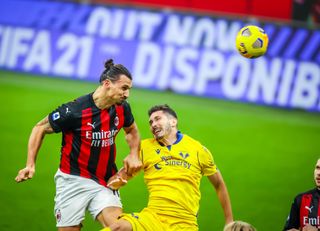 Zlatan Ibrahimovic scores with a header for AC Milan against Verona in Serie A in 2020