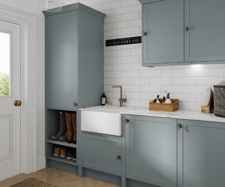 blue utility room with Belfast sink