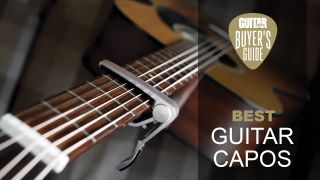 A guitar capo on an acoustic guitar