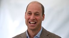 Prince William and Greg James beef - Prince William is pictured grinning as he talks with workers from across the construction industry before visiting a construction site on September 13, 2023 in London, England.