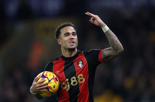 Justin Kluivert of AFC Bournemouth celebrates scoring his team's fourth goal and his hat-trick goal during the Premier League match between Wolverhampton Wanderers FC and AFC Bournemouth at Molineux on November 30, 2024 in Wolverhampton, England.