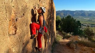 what is trad climbing: Jessie on a climb