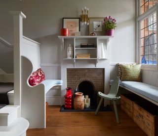 an arts and crafts house with a hallway fireplace