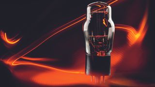 Guitar amp tube on a black and orange background