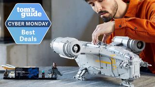 Lego UCS razer crest being built by a man in an orange shirt - with a cyber monday deal sticker