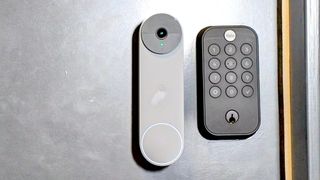 A Nest Doorbell next to a Yale smart lock