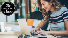 Woman using her laptop at a desk