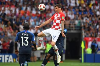 Mario Mandzukic of Croatia wins a header during the 2018 World Cup final against France