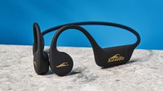 A pair of H2O Audio Tri 2 Pro bone conduction headphones for swimming