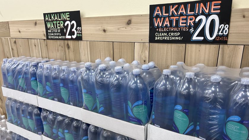 A rack of alkaline water in the grocery store