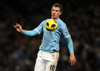 Edin Dzeko in action for Manchester City in 2011