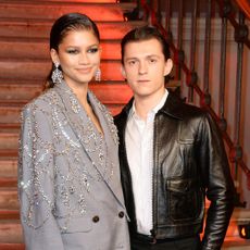 Zendaya and Tom Holland attend a photo call for 'Spider-Man: No Way Home'