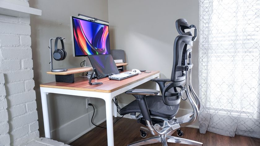 An angled view of a desk setup built around the Branch Four Leg Standing Desk