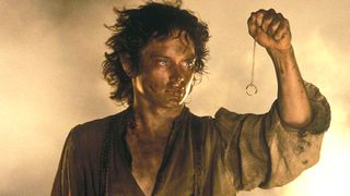 Lord of the Rings Timeline: Elijah Wood as Frodo holding the One Ring during The Return of the King.