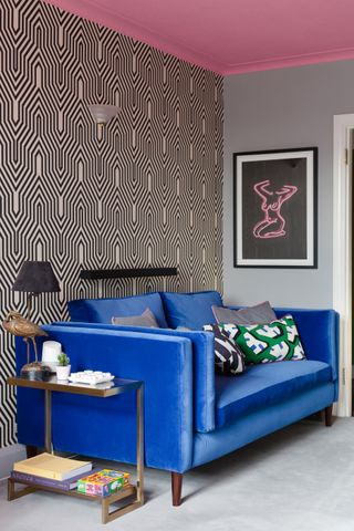 Monochrome living room wallpaper with electric blue soda and modern wall art