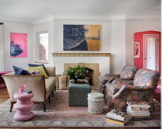 living room with white walls and colorful decor